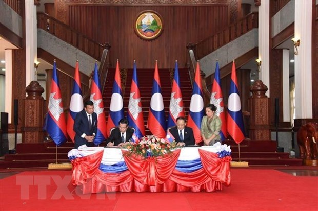 Laos-Cambodge: renforcement de la cooperation entre le PRPL et le PPC hinh anh 1
