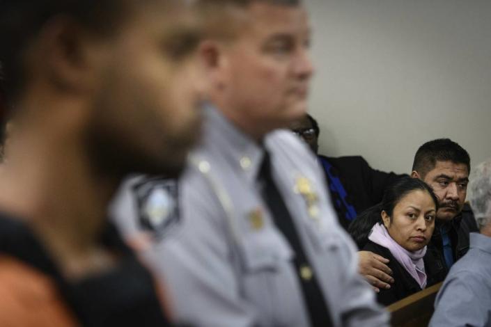 Celsa Maribel Hernandez Velasquez , mother of Hania Aguilar, stares at Michael Ray McLellan, 34, during his first appearance for the kidnapping and murder of Hania Aguilar on Monday, Dec. 10, 2018, in Lumberton, N.C.