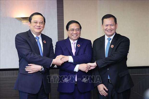Le Vietnam, le Laos et le Cambodge s’engagent a renforcer leur solidarite pour assurer la securite hinh anh 1